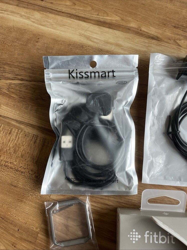 Various Fitbit accessories & Fitbit inspire 2 complete untested , bands chargers