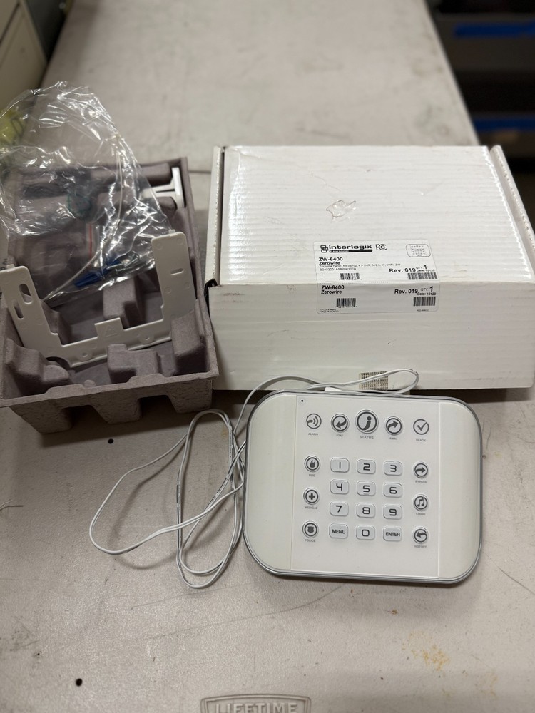 Interlogix / GE keypad + mounting hardware