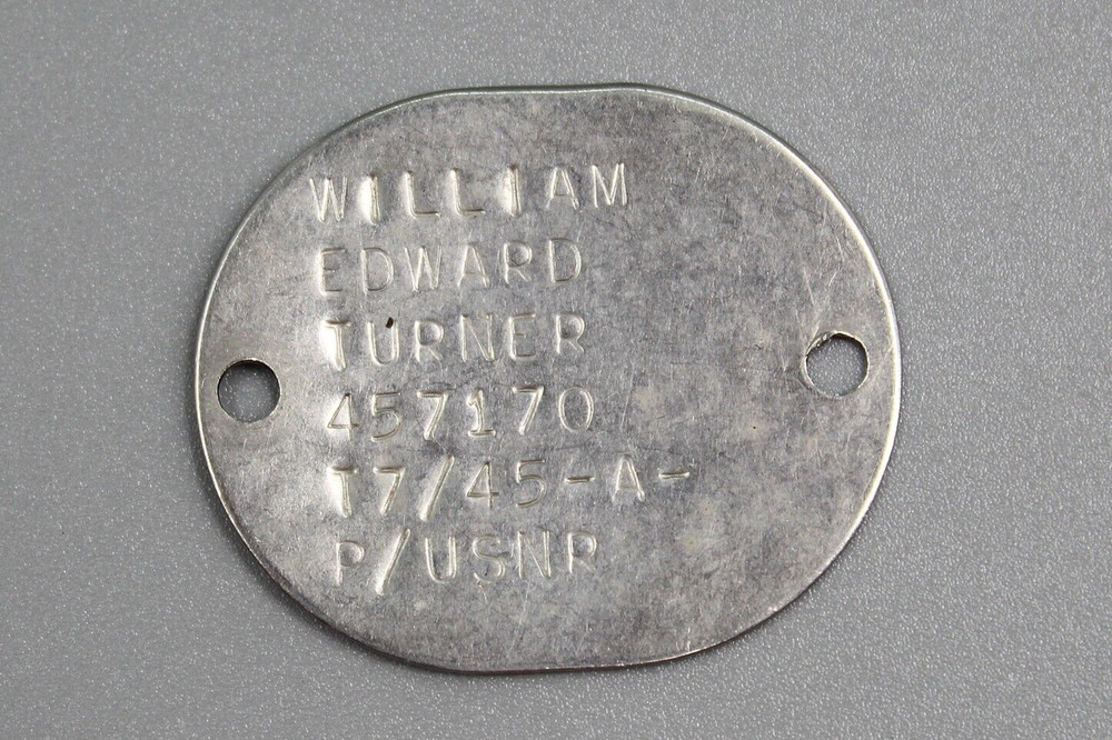 USNR WW2 Single Id Tag – 7/45 . FLU1555