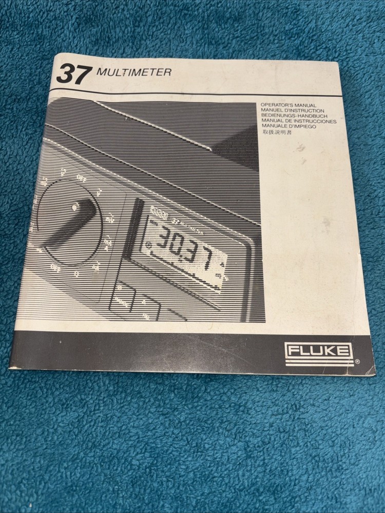 Fluke 785303 1986 37 Multimeter Operator’s Manual LOC E