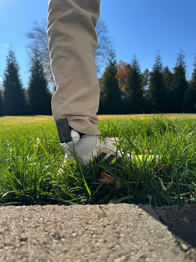 Found it - Golf Ball Ankle holder for cheating golfers