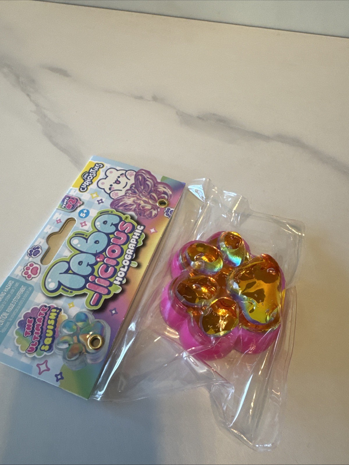 Orb Toys TABA-licious Holographic Paws Paw Print Ultimate Squish Toy Pink Gold