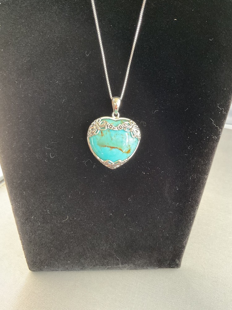 STER.LING SILVER AND TURQUOISE PENDANT