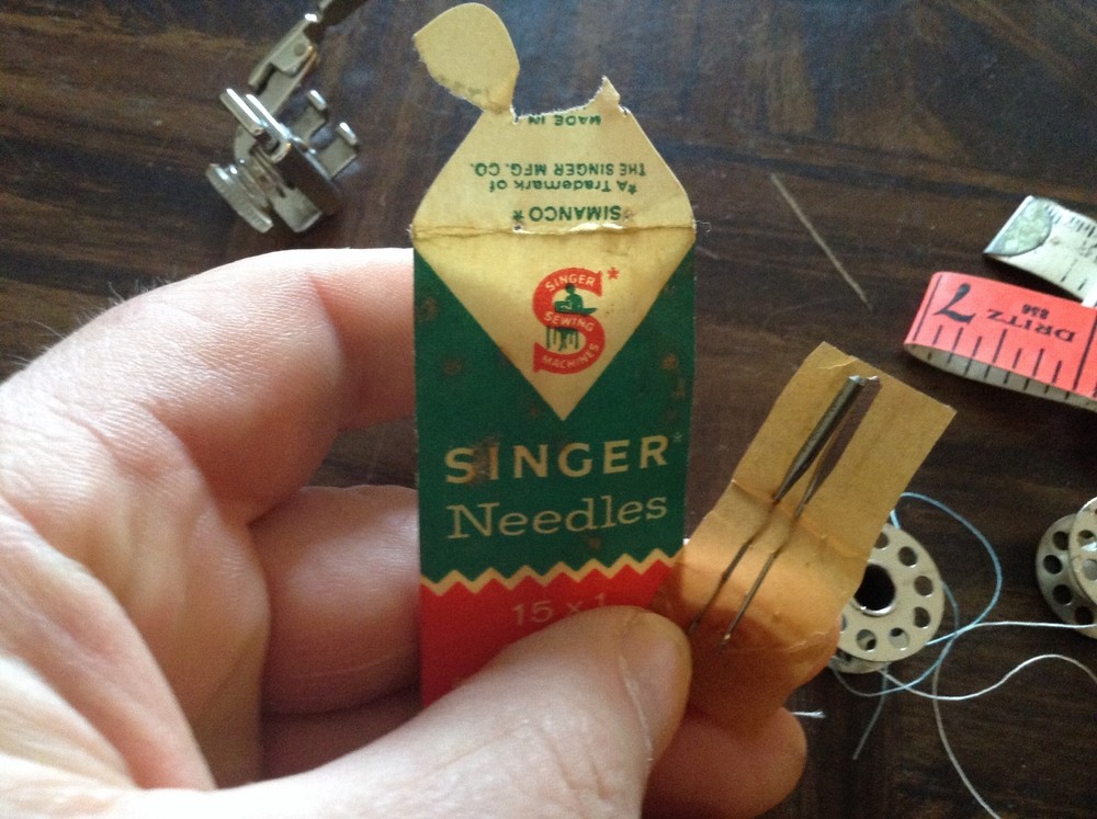 Singer sewing machine needles and etc.