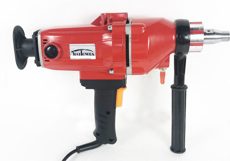 220V Diamond Core Drill Concrete Machine, five drill bits included.