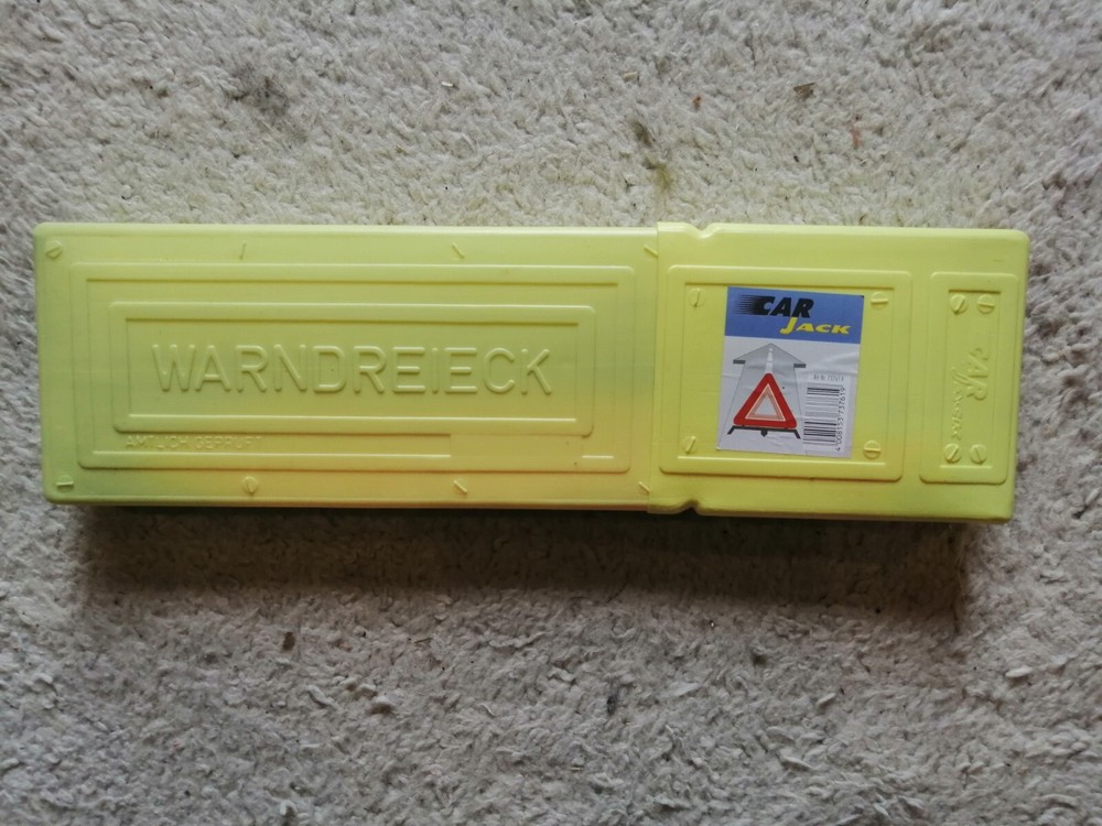 old warning triangle car jack