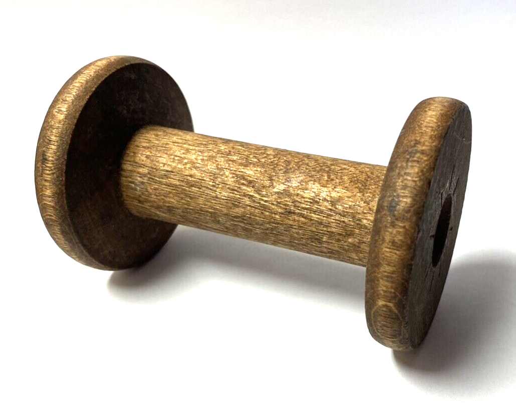 A Lot of Twenty Five 4 Inch Wooden Silk Spools