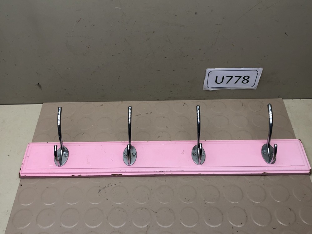 4 Chrome Hooks on Pink Wall Coat Rack