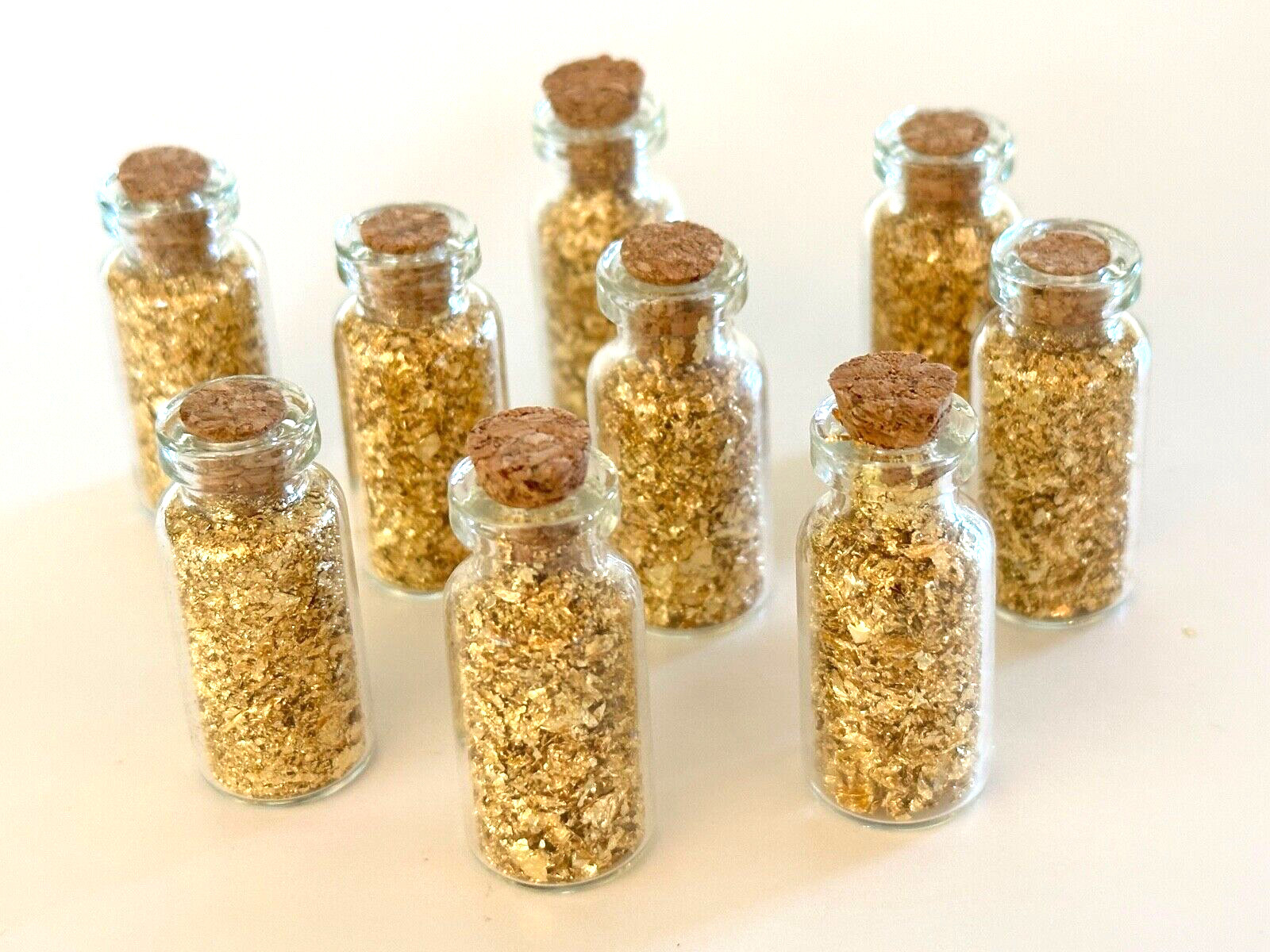 9 Bottles of Large Gold Flakes .....