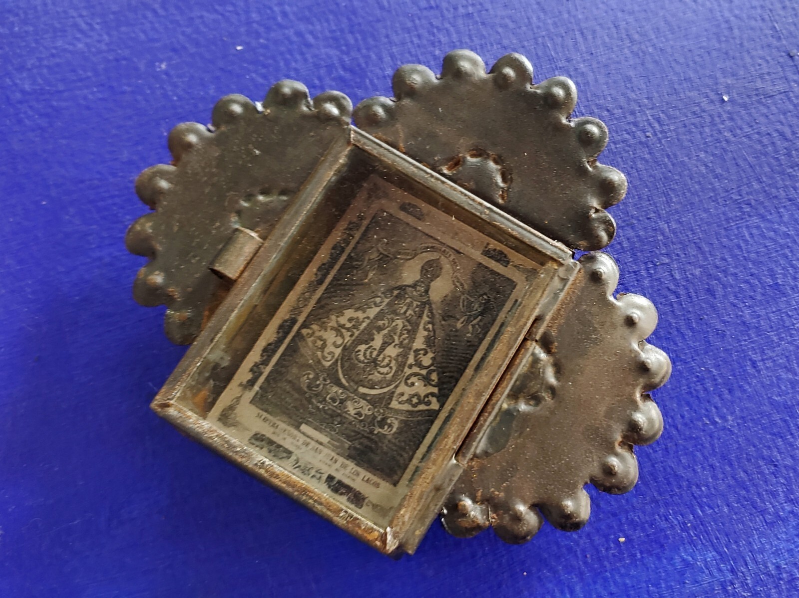 Rustic Mexican Virgen de San Juan de los Lagos tin wall hanging nicho folk art