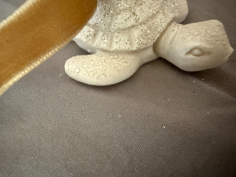 small white ceramic turtle ornament