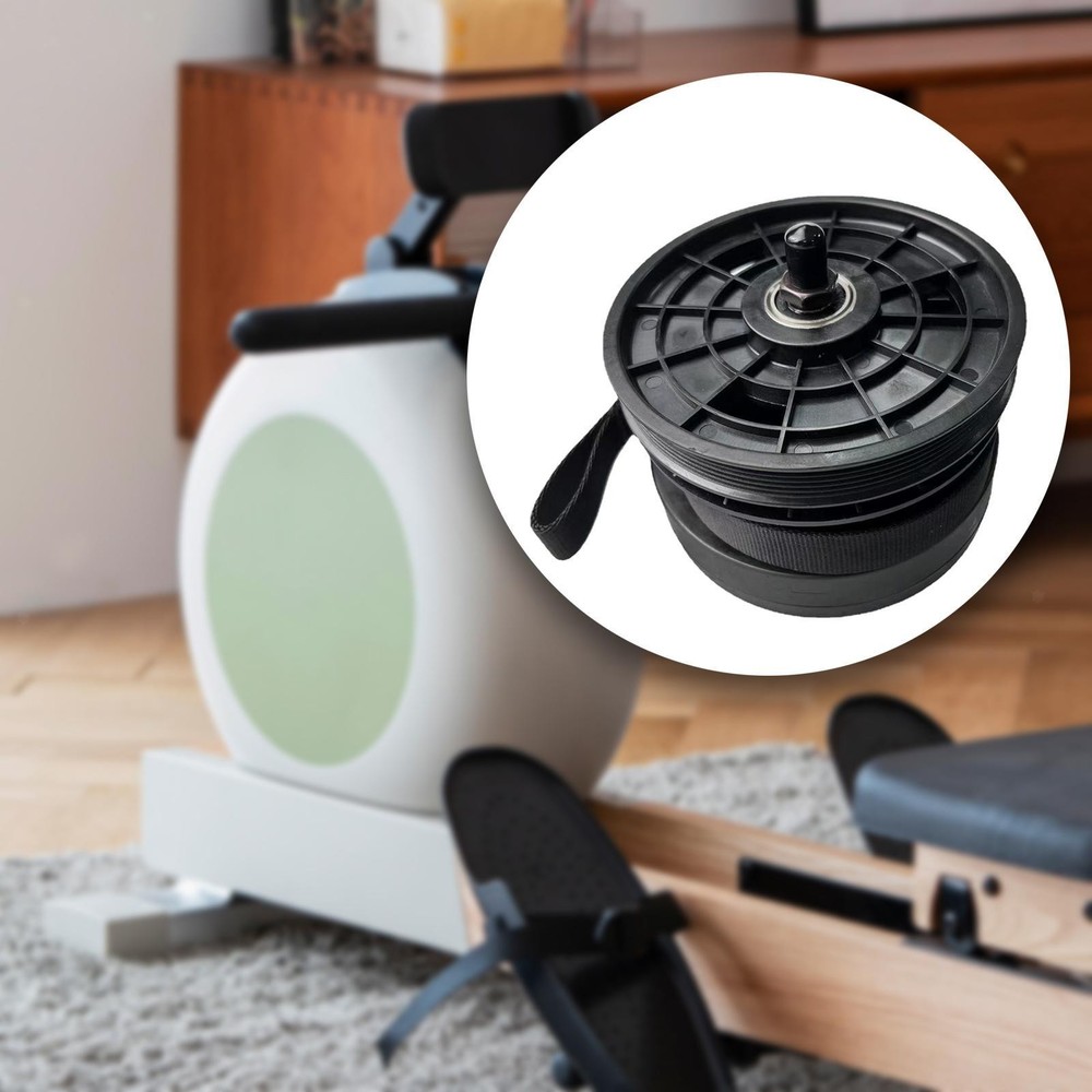Rowing Machine Resistance System with Webbing and Gravity Wheel