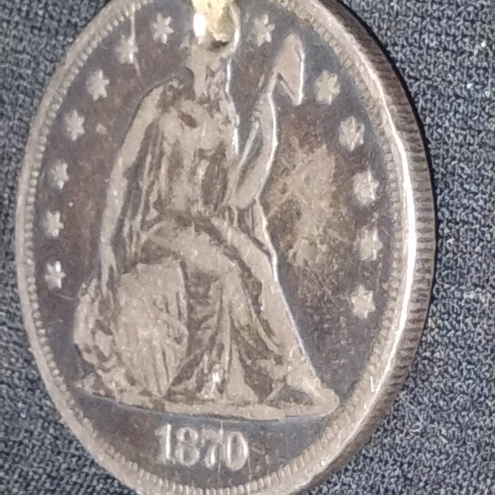 1870 Seated Liberty Dollar