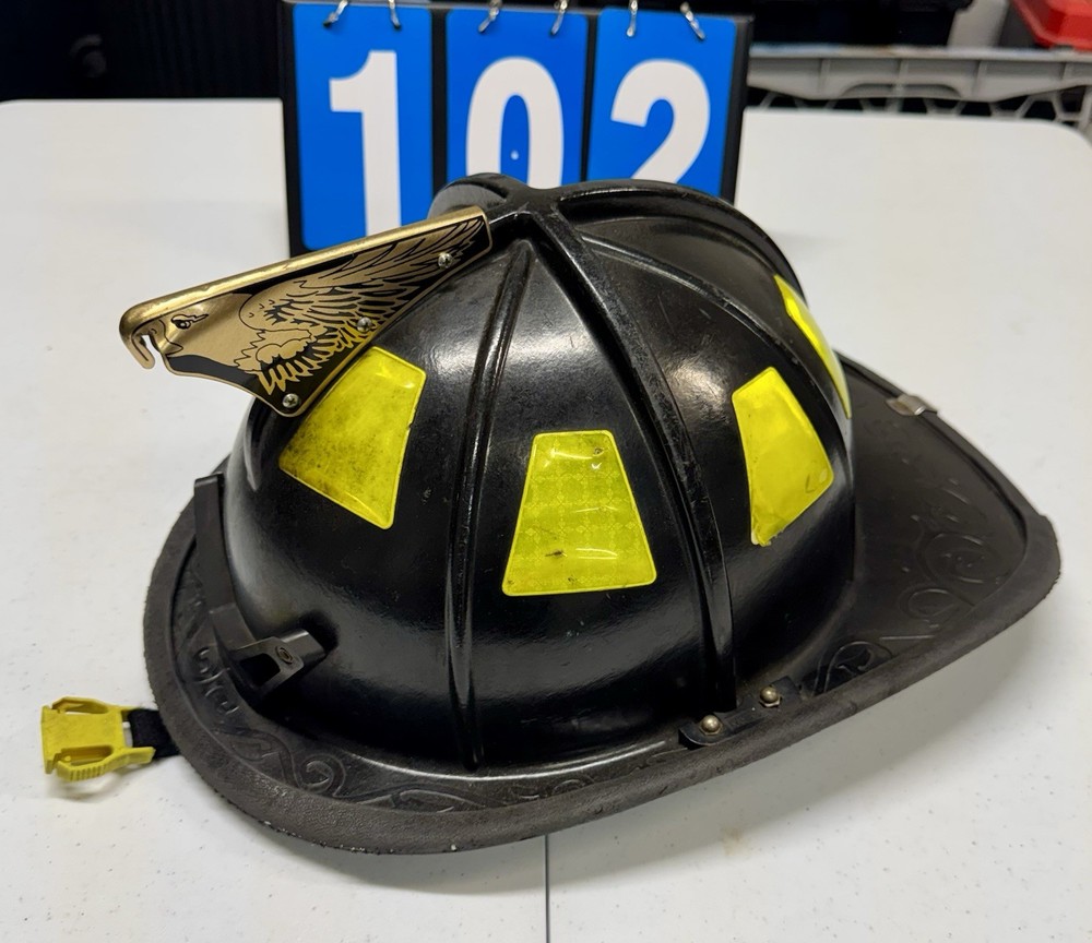 CAIRNS BRO 1044 FIRE HELMET  BLACK WITH DEFENDER SHIELD  USED