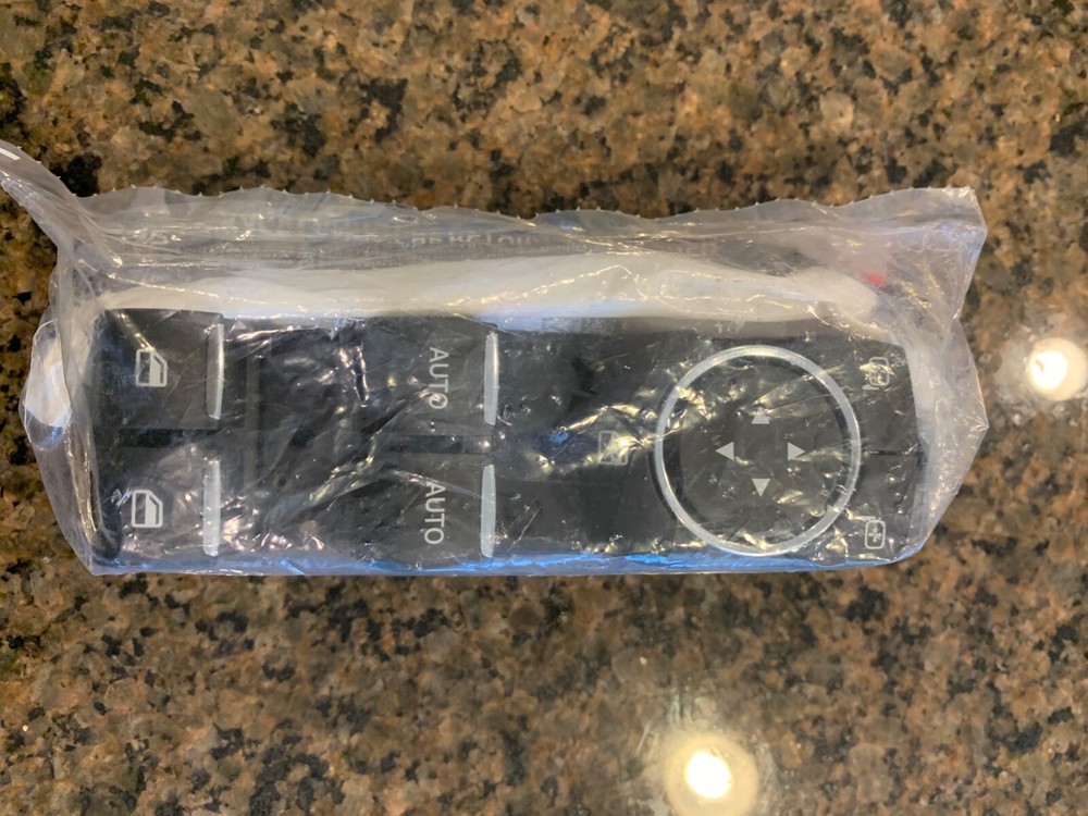 Ford Explorer drivers side window controller -new, unopened. Free Shipping US