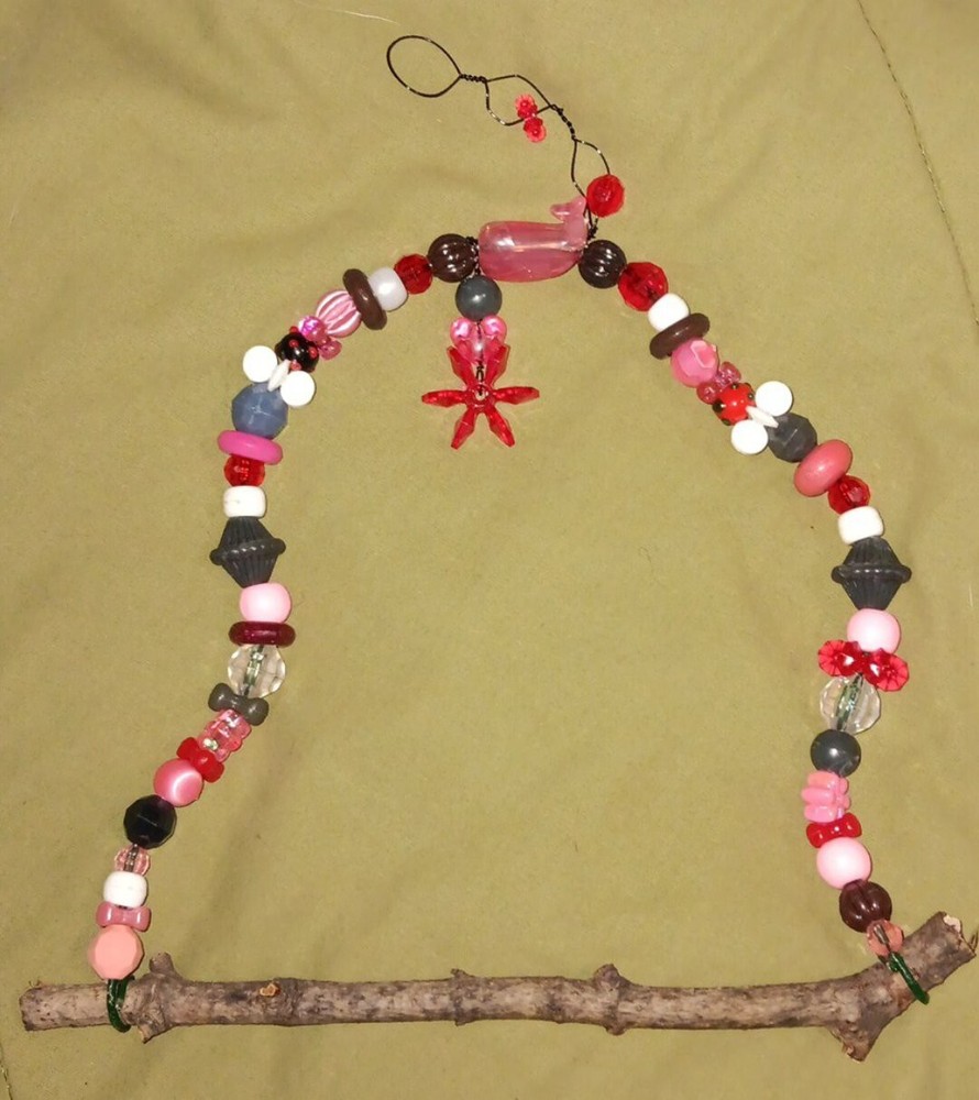 Handmade beaded hummingbird swing