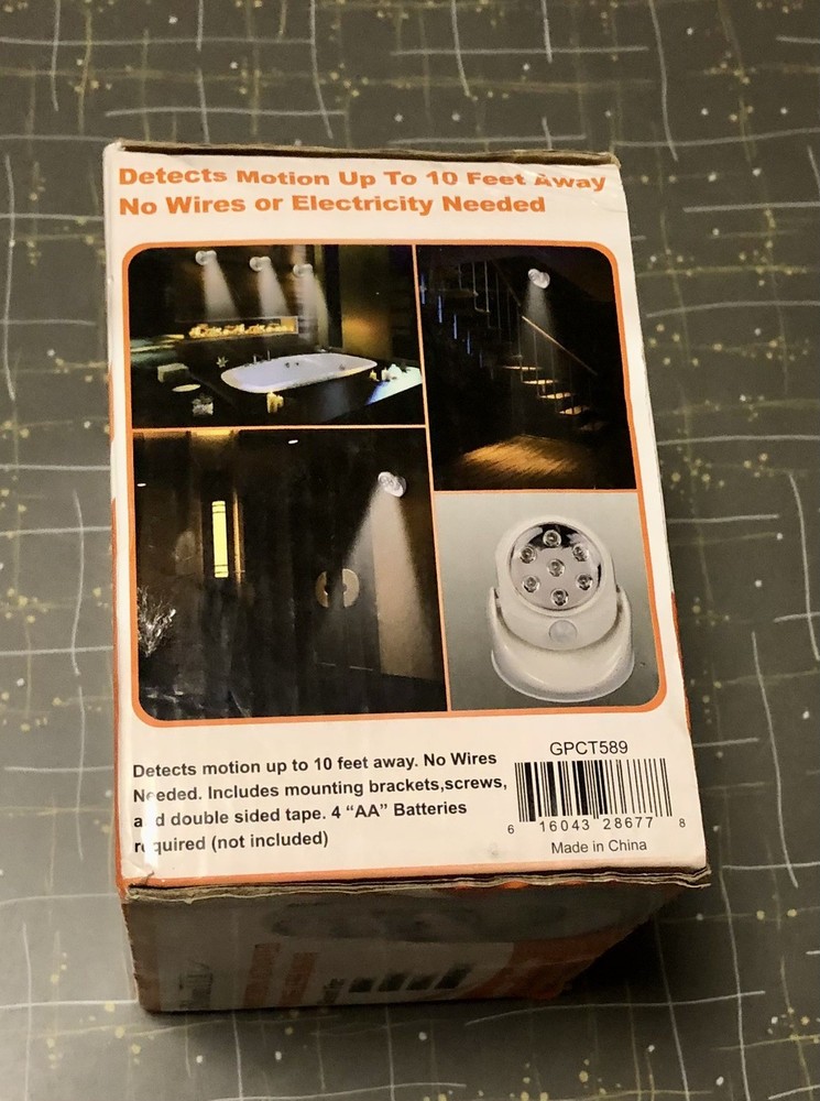 NIB Motion Activated Cordless Light with 7 LED Bulbs