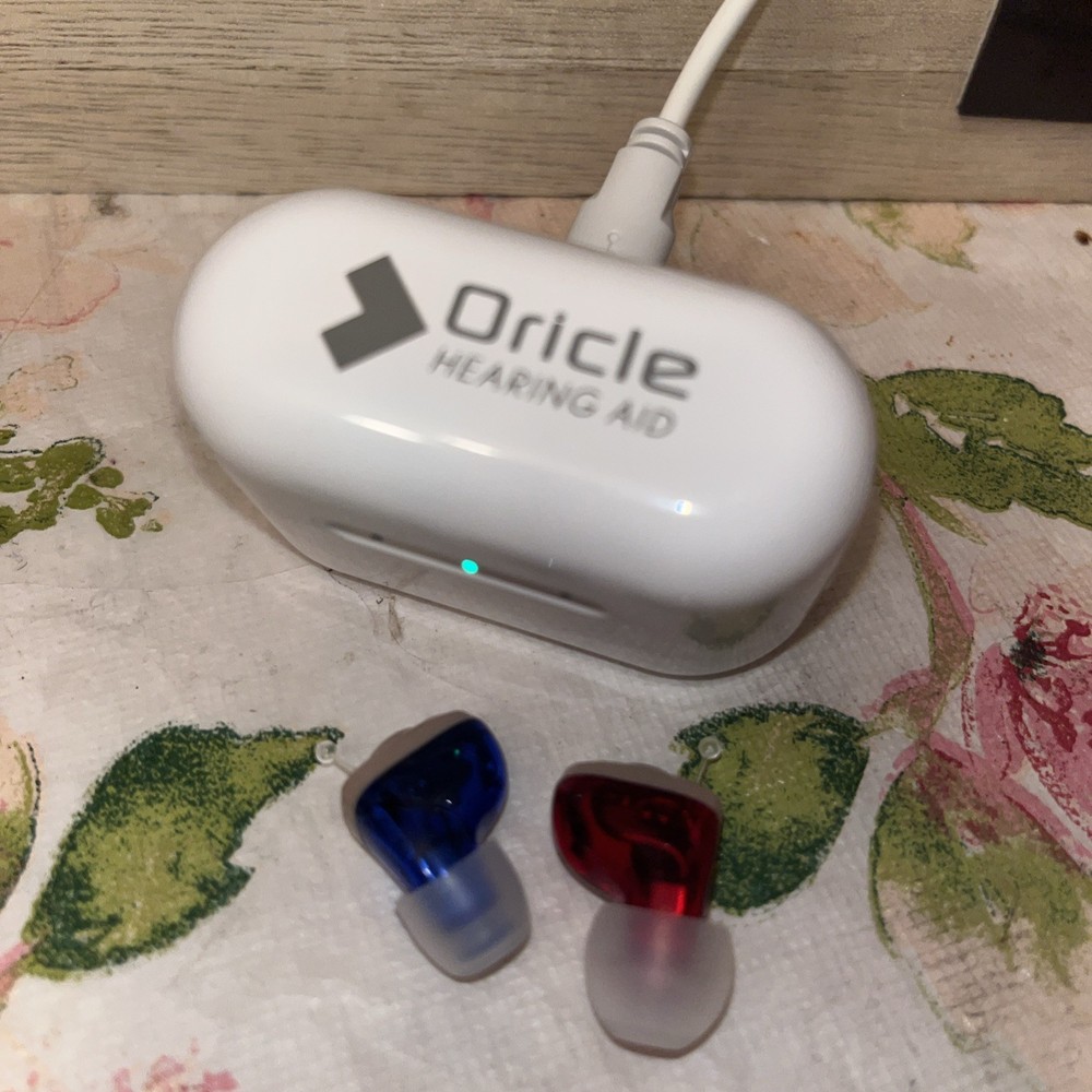 In-Ear Hearing Amplifiers, Rechargeable, with new tips, excellent condition.