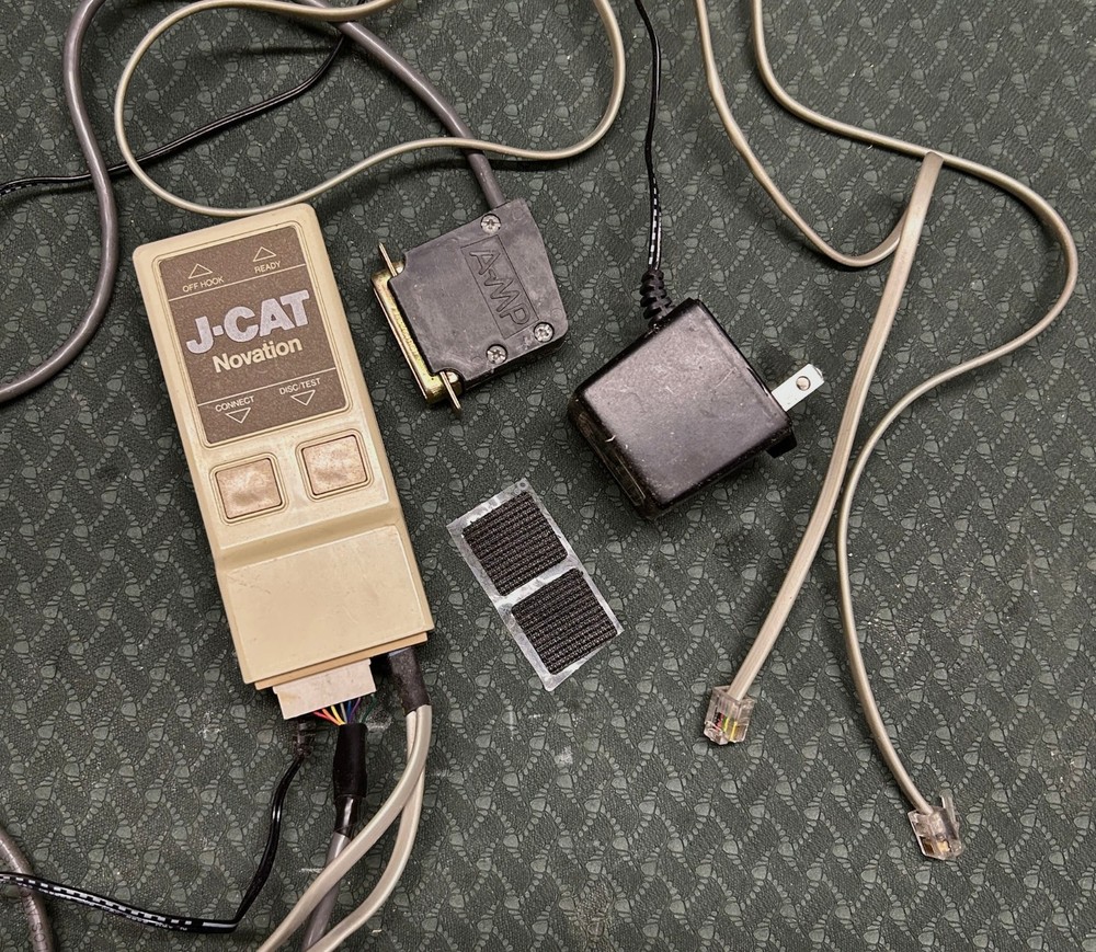 Novation J-Cat Modem with Data & Power Adaptors, software, manual