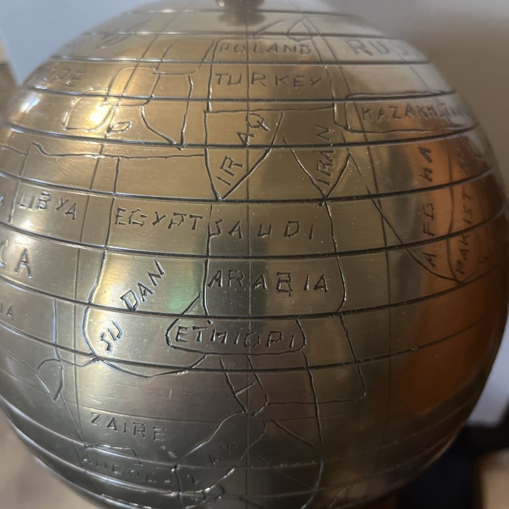 Bains Kushnick Clock Globe