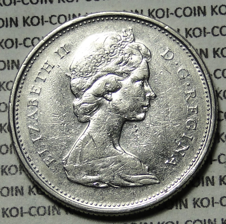 *ERROR*circle bump*1976 Canada 25c coin