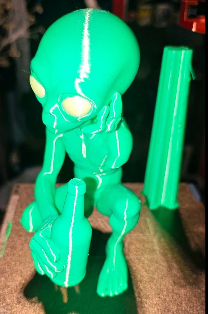 Alien Drinking A Beer Figure