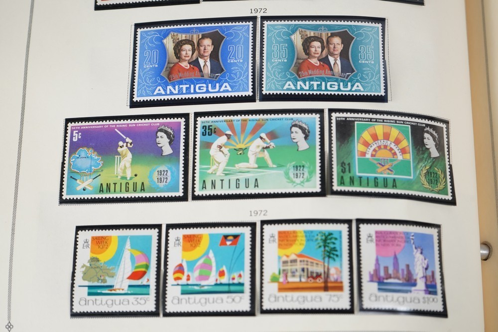 WORLDWIDE A-L 1970s COLLECTION OF 875+ STAMPS MINT & USED STORED IN SCOTT ALBUM