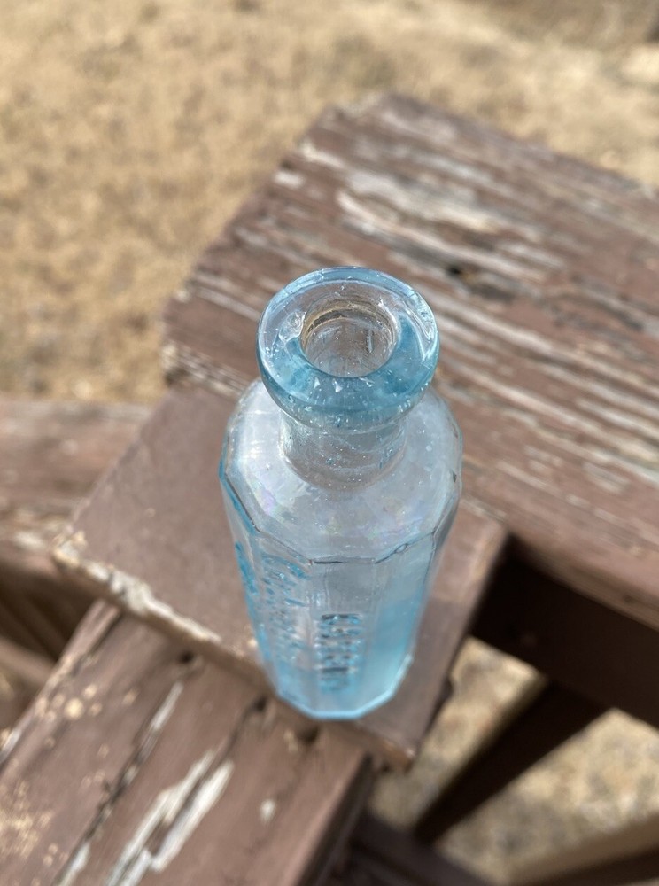 Carbona Products Co 12-sidesd Blown Bottle