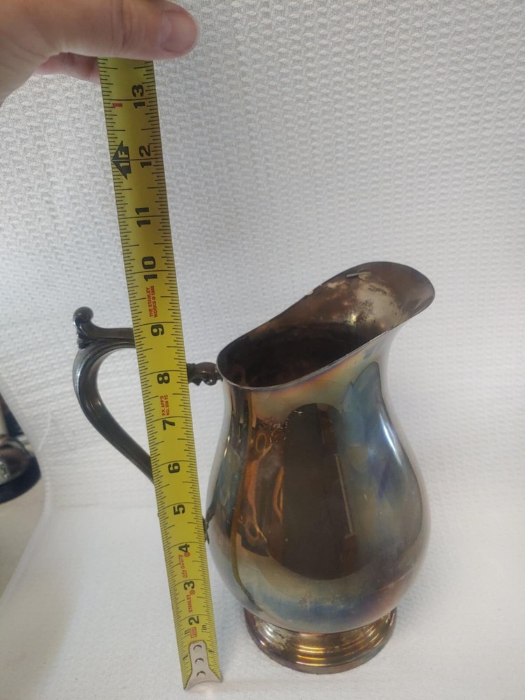 WM rogers water pitcher missing ice lip
