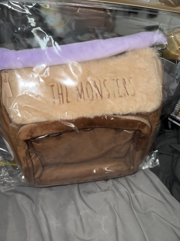 The Monsters Fuzzy Backpack