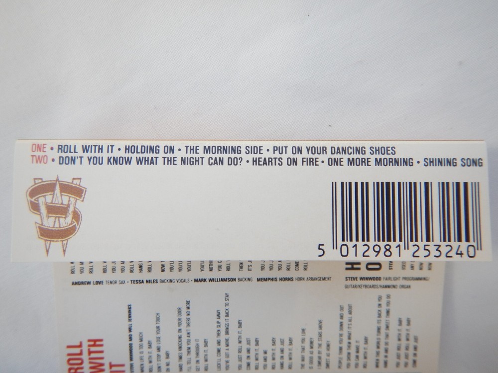 STEVE WINWOOD - ROLL WITH IT - CASSETTE