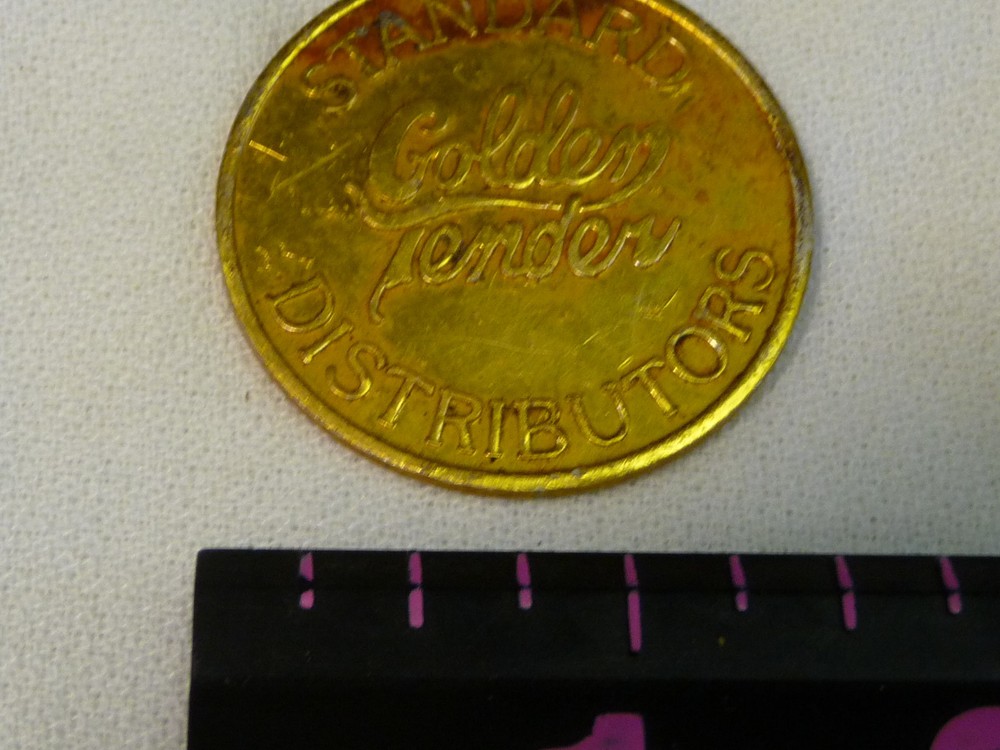 STANDARD DISTRIBUTORS GOLDEN TENDER $5 TOKEN