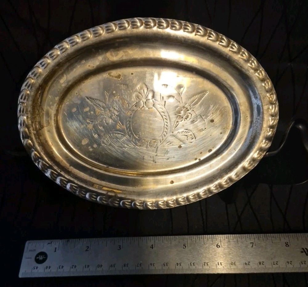 Silver-plated oval serving tray with decorative rope edge and engraved 6.5"x4.5"
