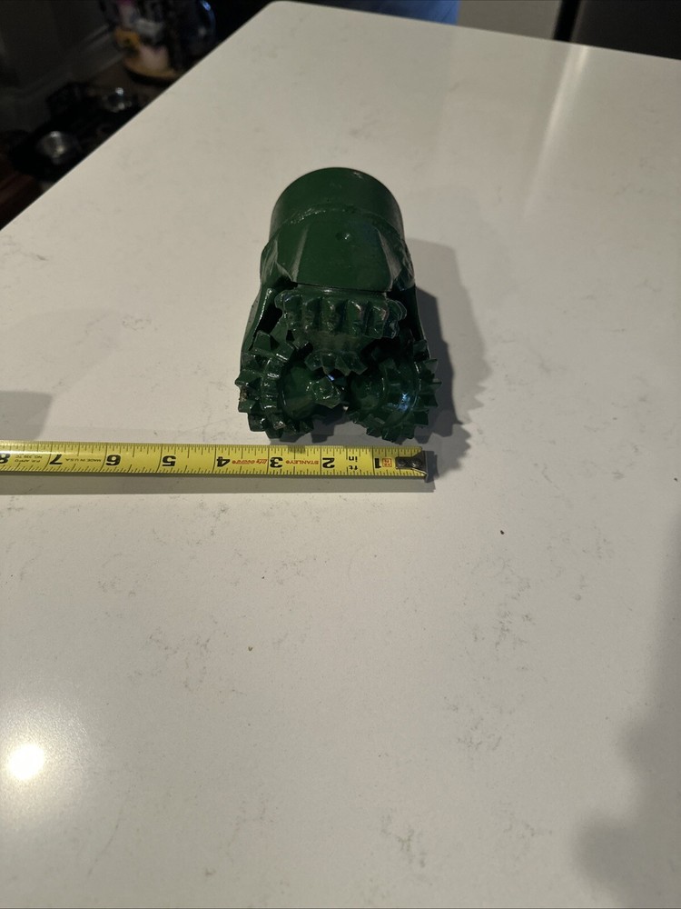Tricone drill bit