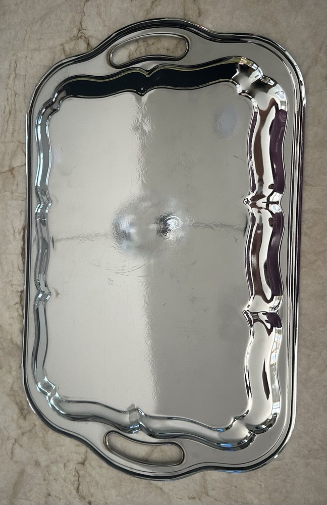 Two Chrome Plated Serving Platters, One Irvingware