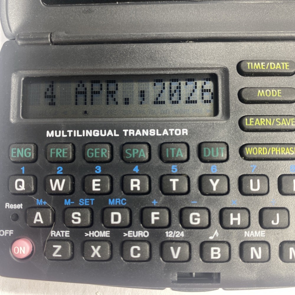 Bell &Howell Electronic Multilingual Translator Calculator QuickReference Guide