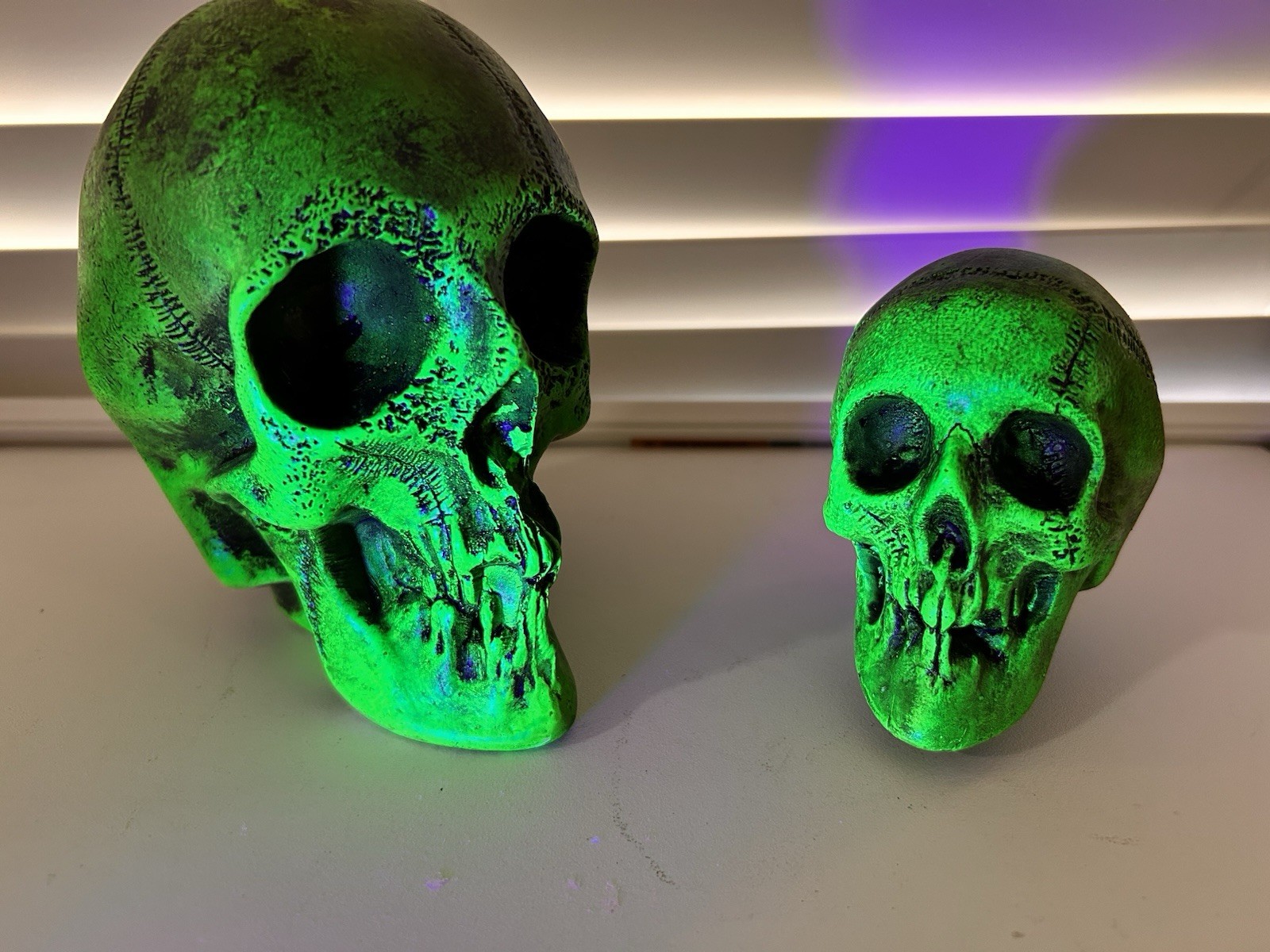 2 EA. RANDOTTI ORIGINAL FLUORESCENT GREEN LARGE & MEDIUM SKULLS STILL GLOW