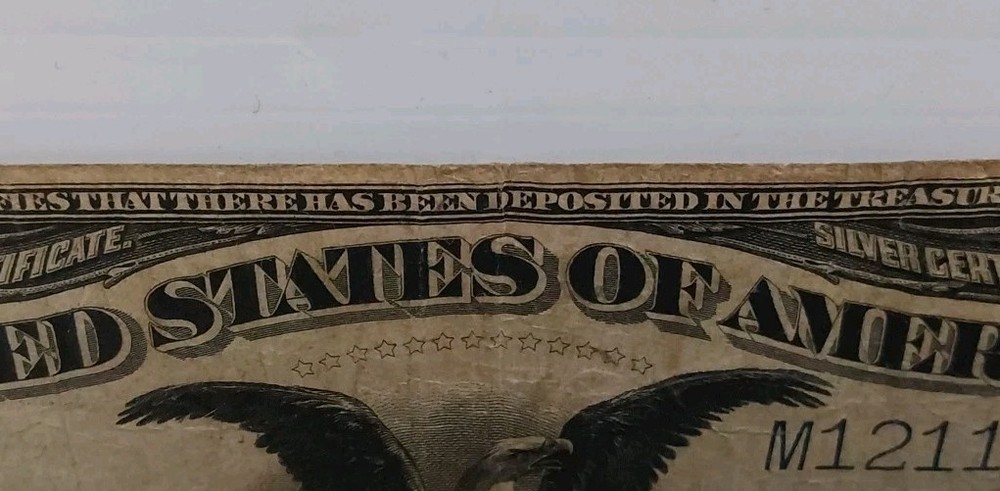 1899 1$ Black Eagle Silver Certificate - Serial# M12110321A (CIRCULATED)