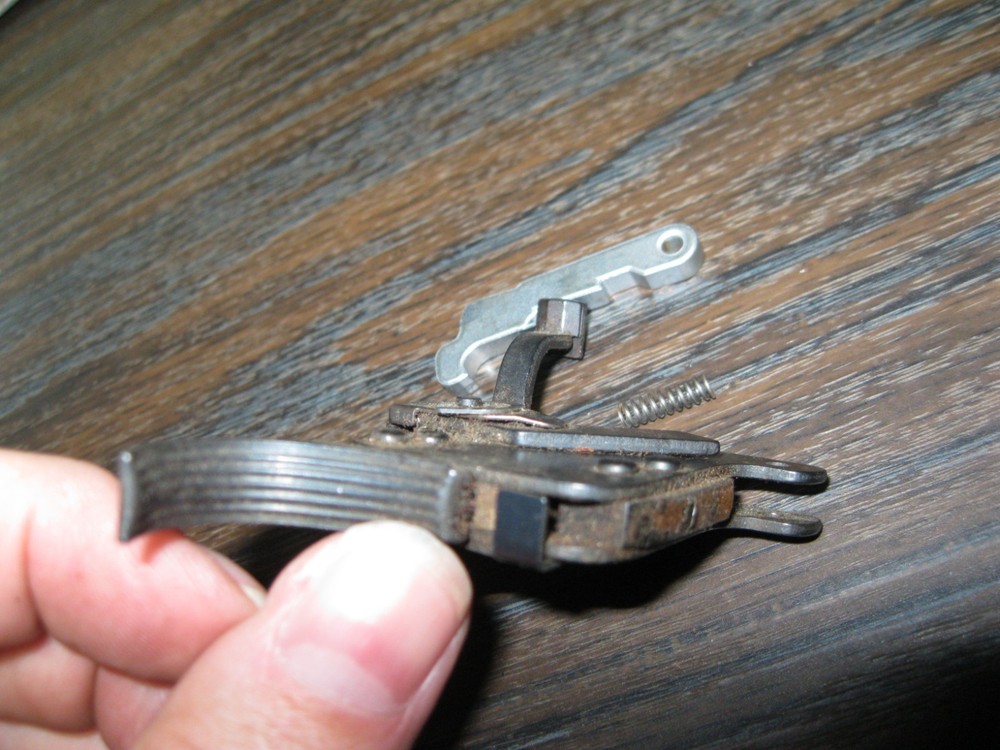 Used Remington 700 Trigger assembly with sear and spring