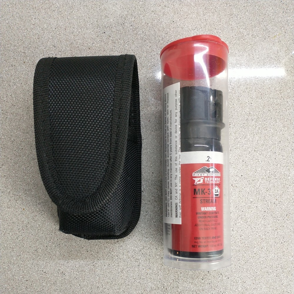 One (1) Defense Technology OC Stream MK-3 .2% Solution w/ Ballistic Nylon Holder