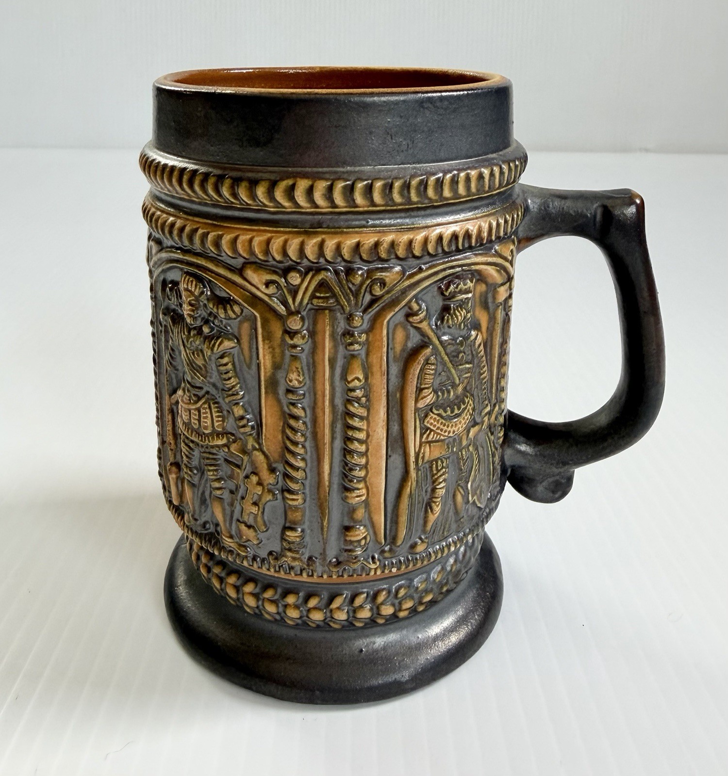 Vintage German Tankard Mug Beer Stein Brown/Orange Medieval Figures In Relief