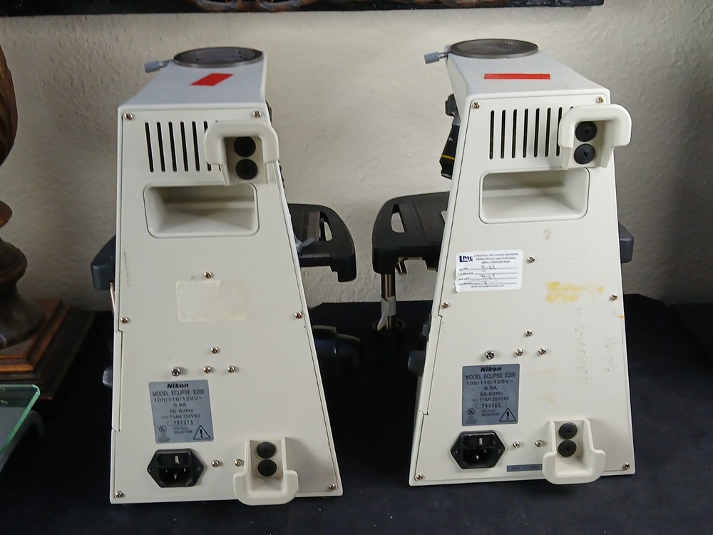 (2) Nikon Eclipse E200 Microscopes & E Plan 4 10 40 100X Oil Sets (No Heads)