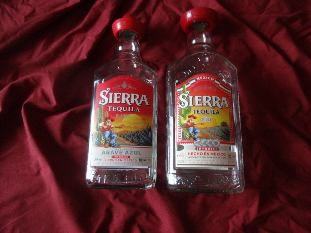 Two empty Sierra Tequila bottles- Blanco and Silver (superb condition)