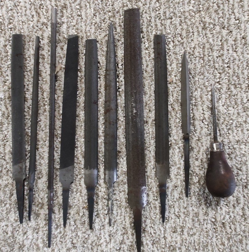 FILE SET WITH SCRAPER AND HANDLED PICK