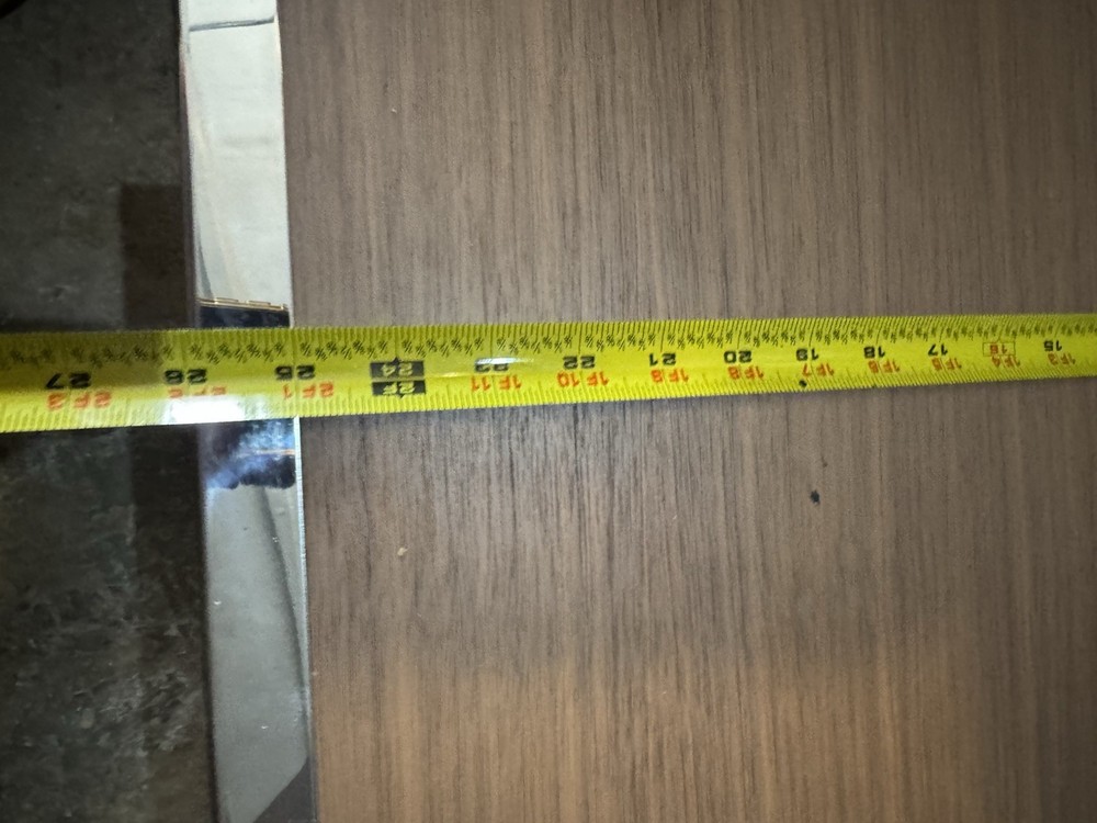 Minimalist side table,consistent with Minotti’s design likely the Hamilton