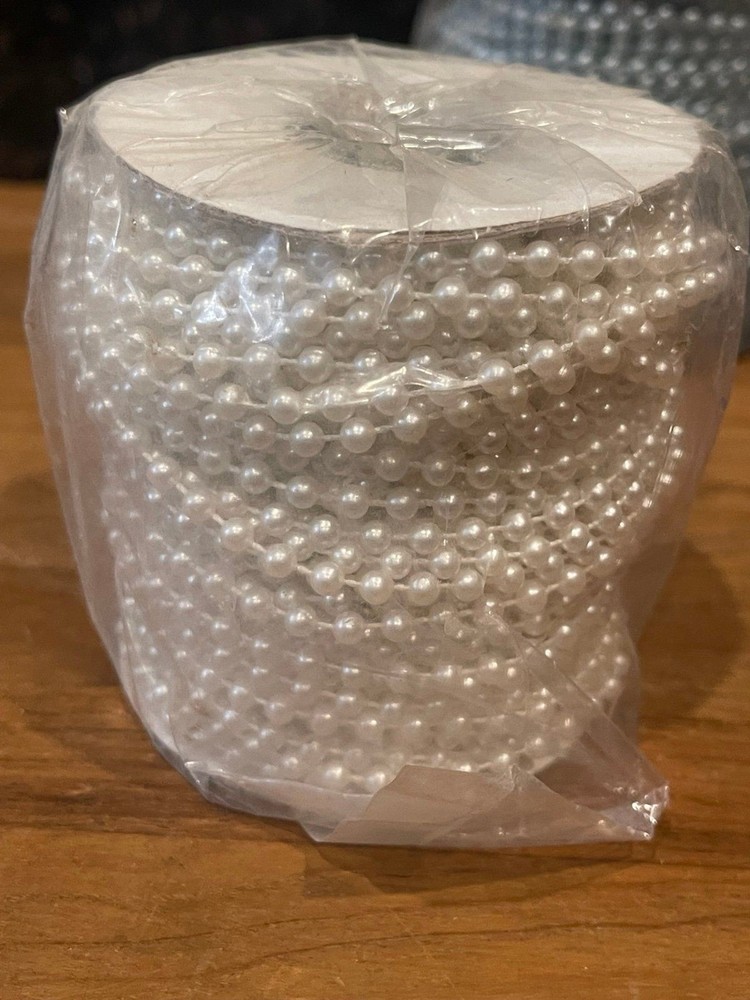 5 rolls of plastic string beads