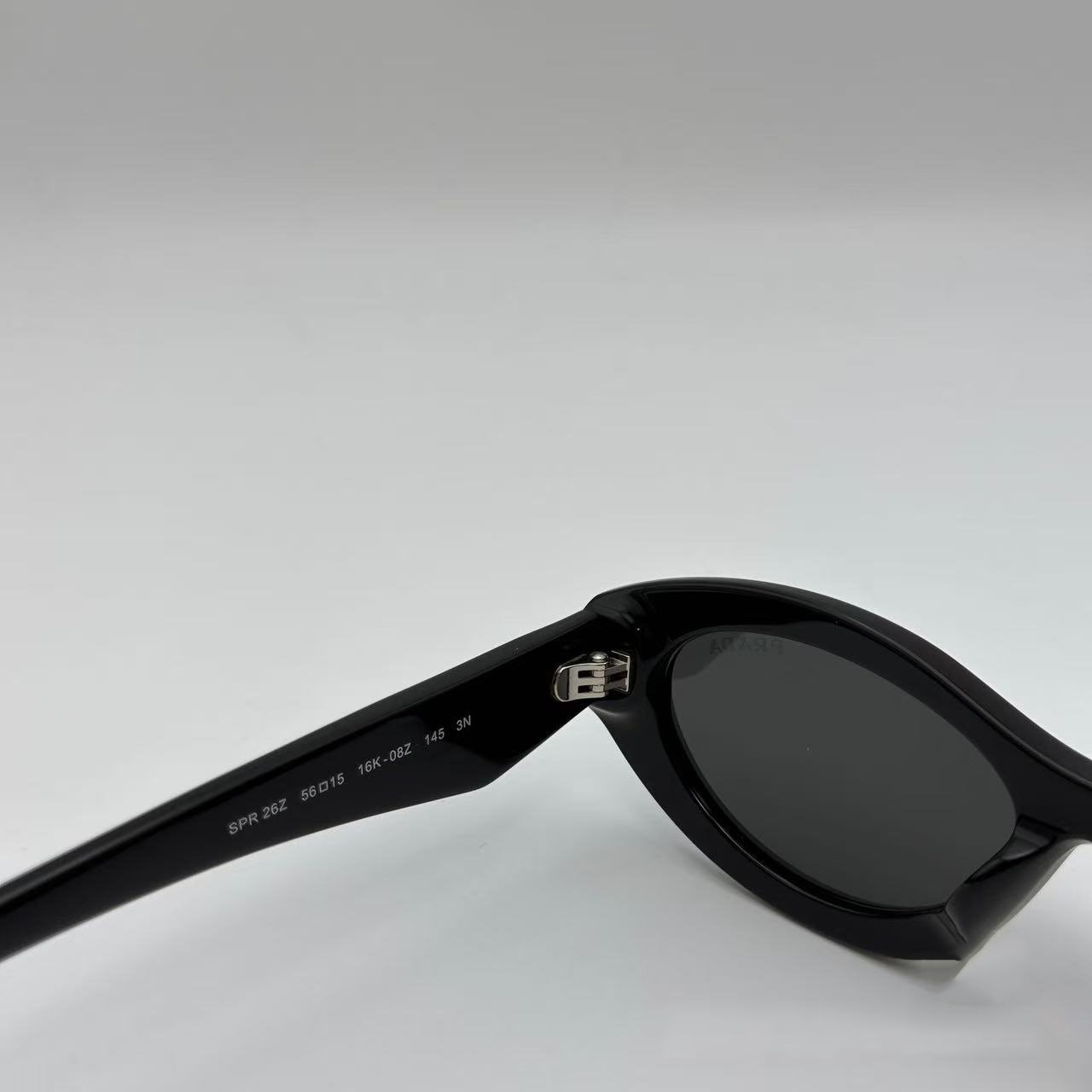 PRADA SPR26Z Black Sunglasses Polished Black Gray Tint Silver Logo