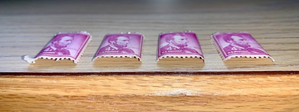 Abraham Lincoln 4 Cent US Postage Stamp Purple