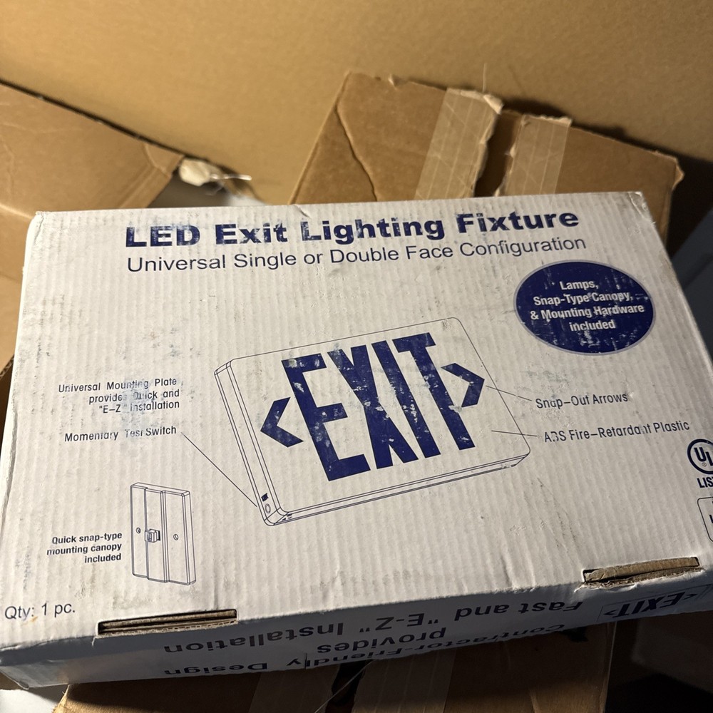 Red Light White Housing Battery Back Up Exit Sign.