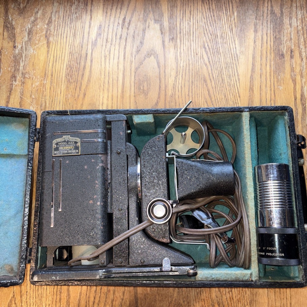 Antique Tri-Purpose projector model AAA 115 Volt. Tested Works!